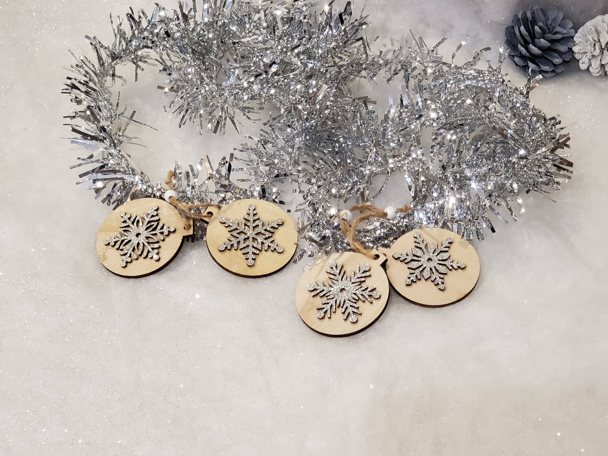 Wooden tree decoration with silver snowflake