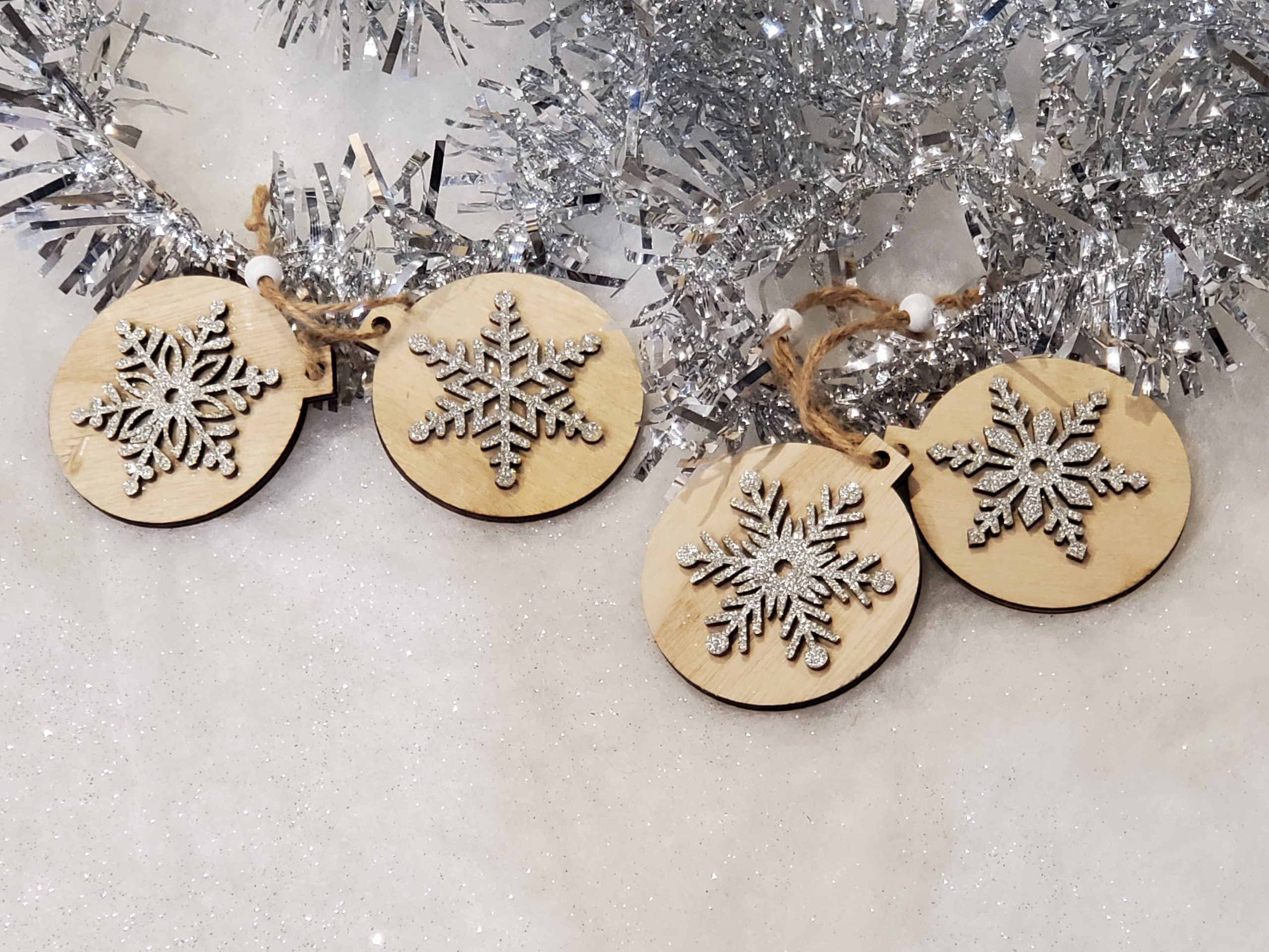 Wooden tree decoration with silver snowflake