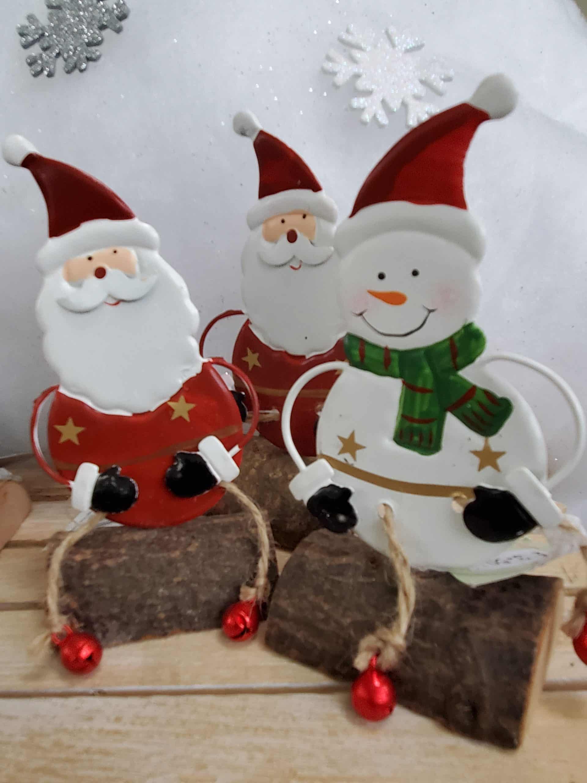 Santa and Snowman sitting on a log