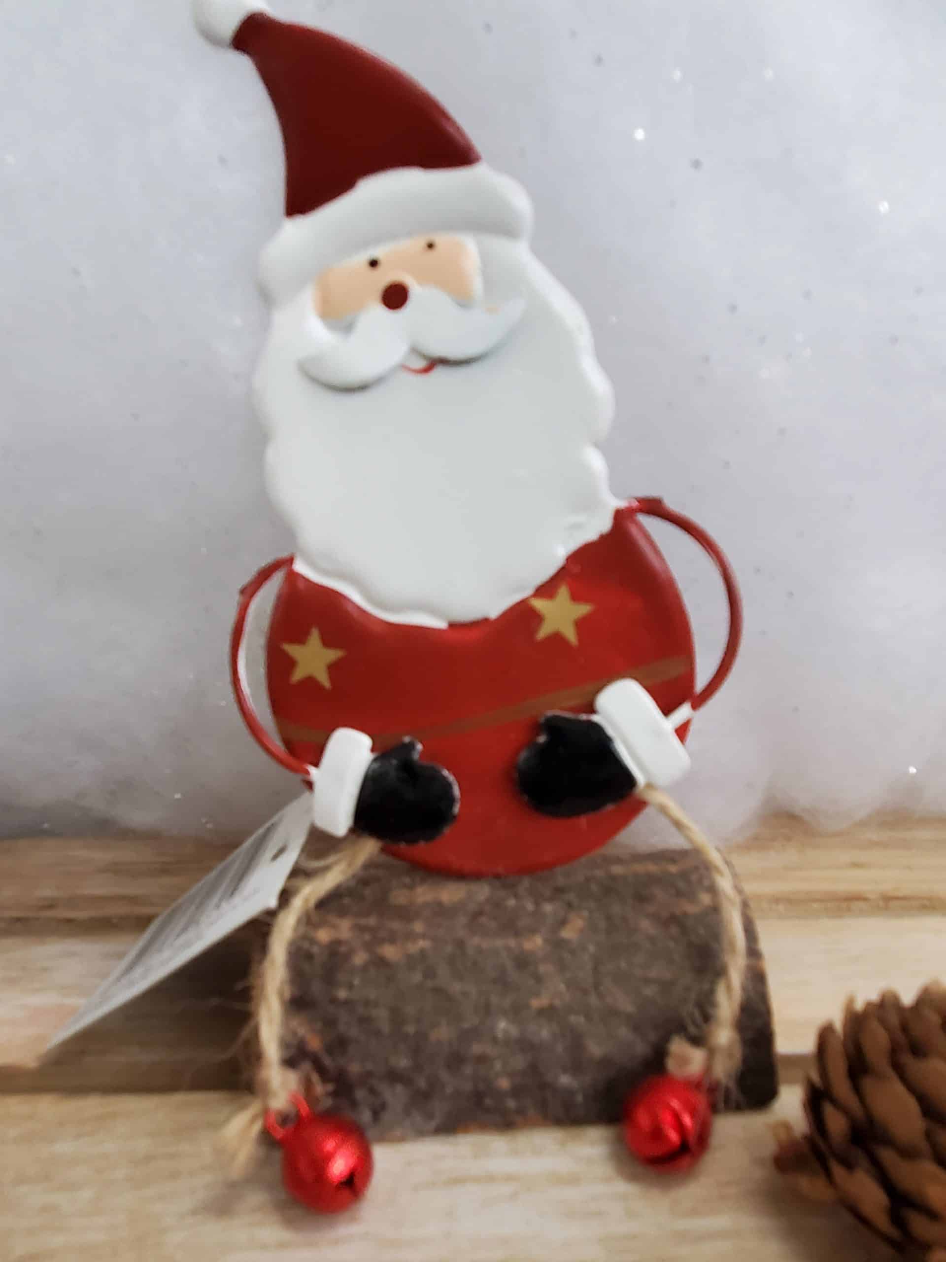 Santa and Snowman sitting on a log